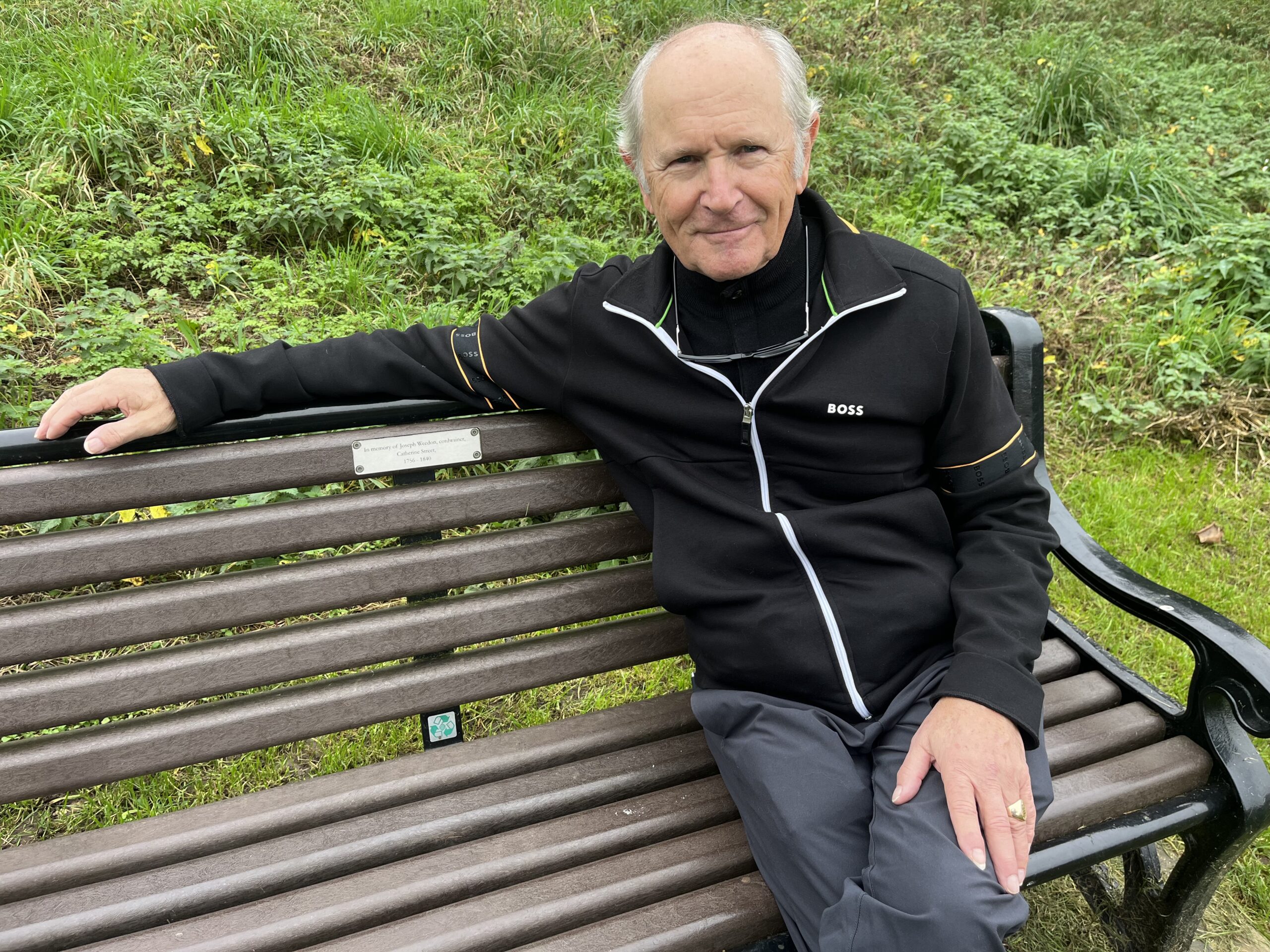 R Peter Weedon on the memorial bench at The Brickie dedicated to his Victorian ancestor.