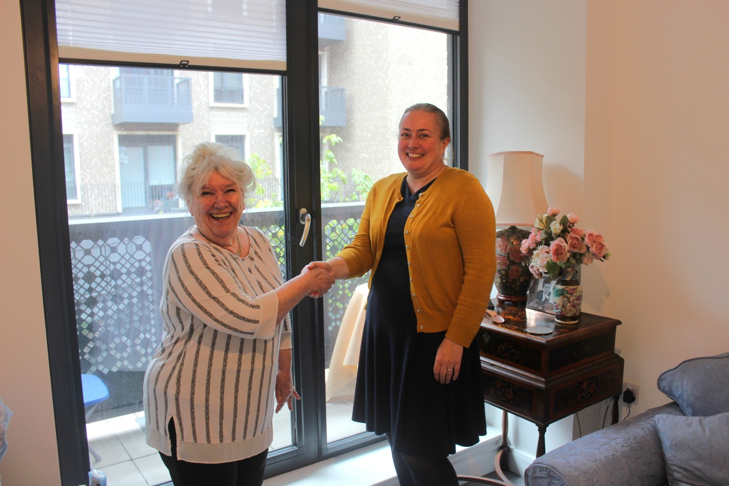 Cllr Jacqui Taylor, right, meets with Jubilee Square tenant Sheila Dawson-Papa.