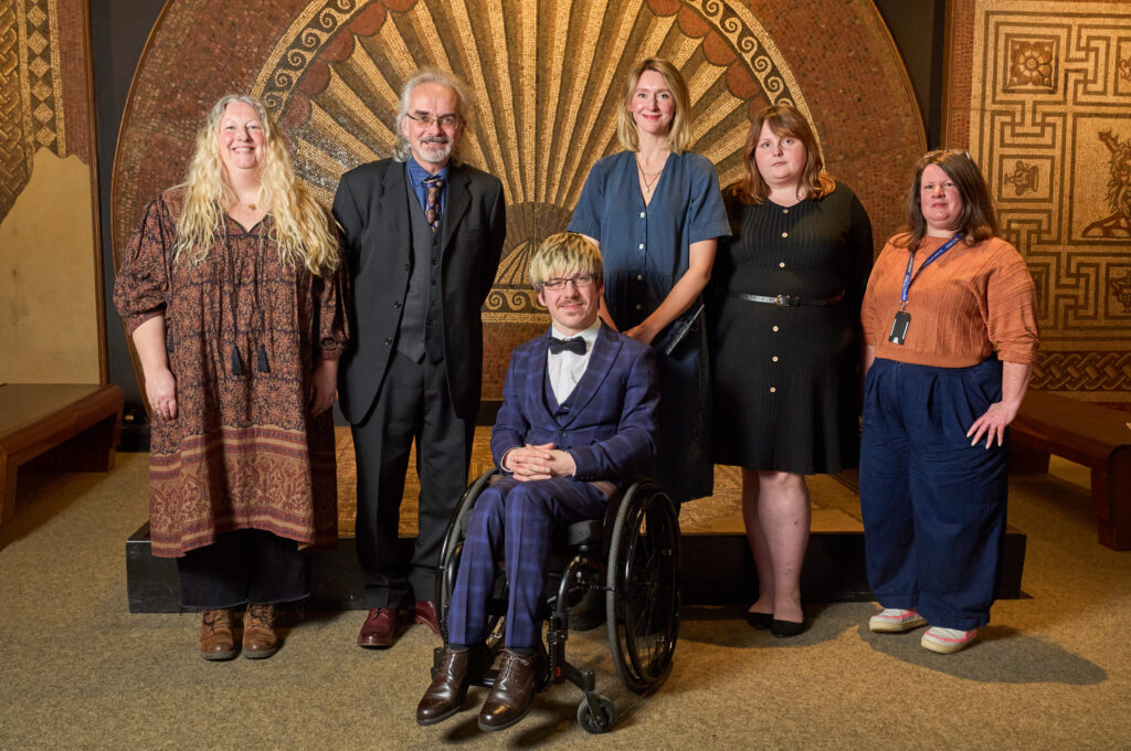 Kyle Lewis Jordan with museum team. Photo: Simon Jacobs.