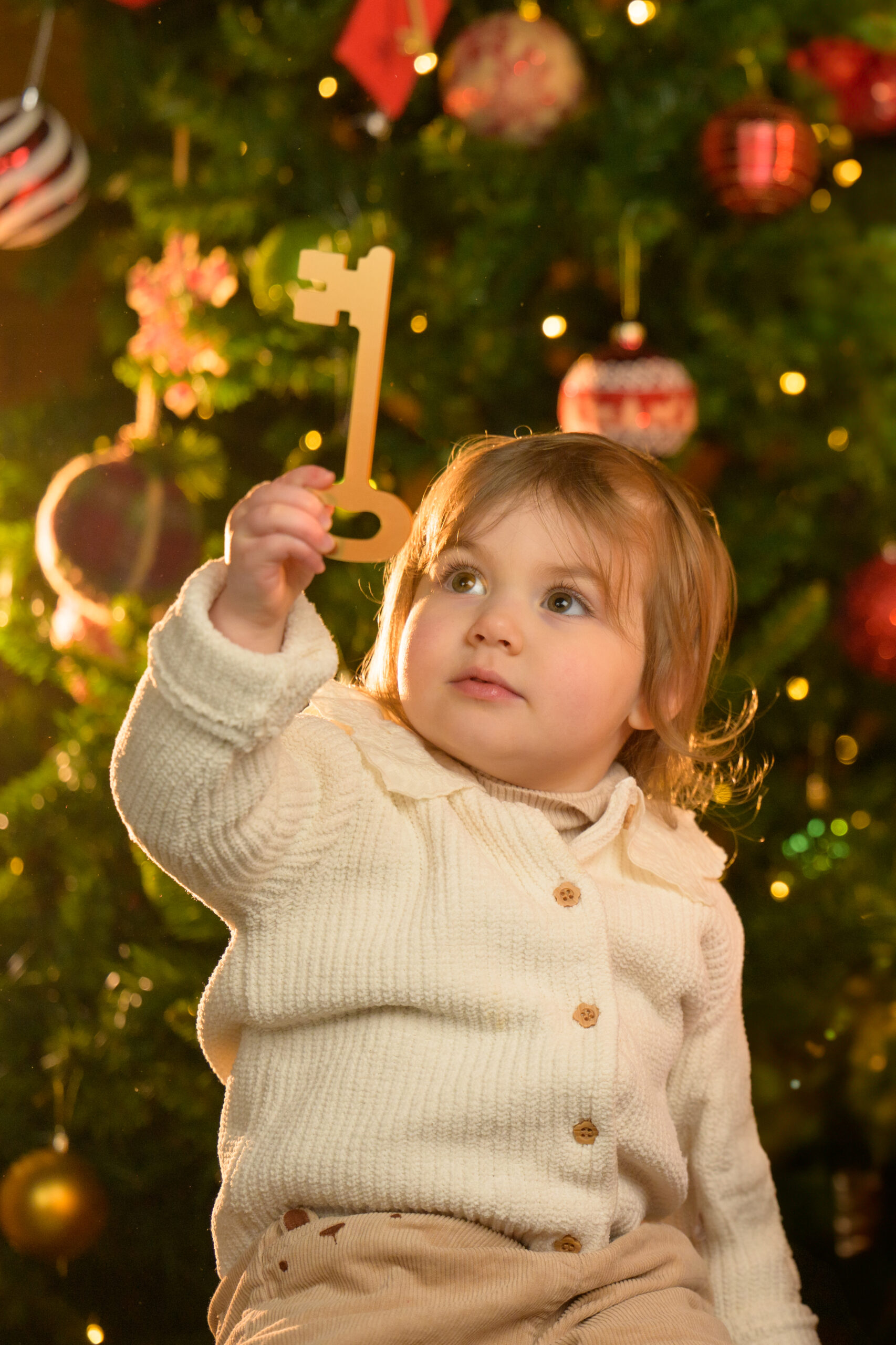 Emily with a key to Santa's toyshop.