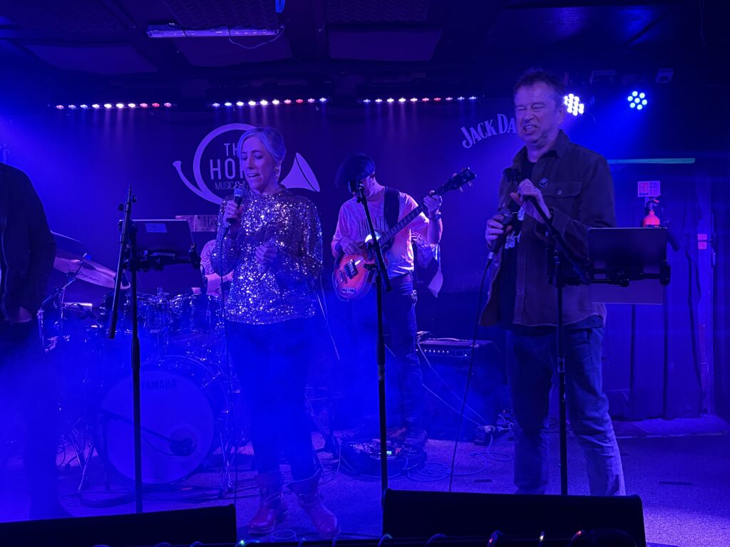 St Albans MP Daisy Cooper performs at The Horn's 50th birthday party.