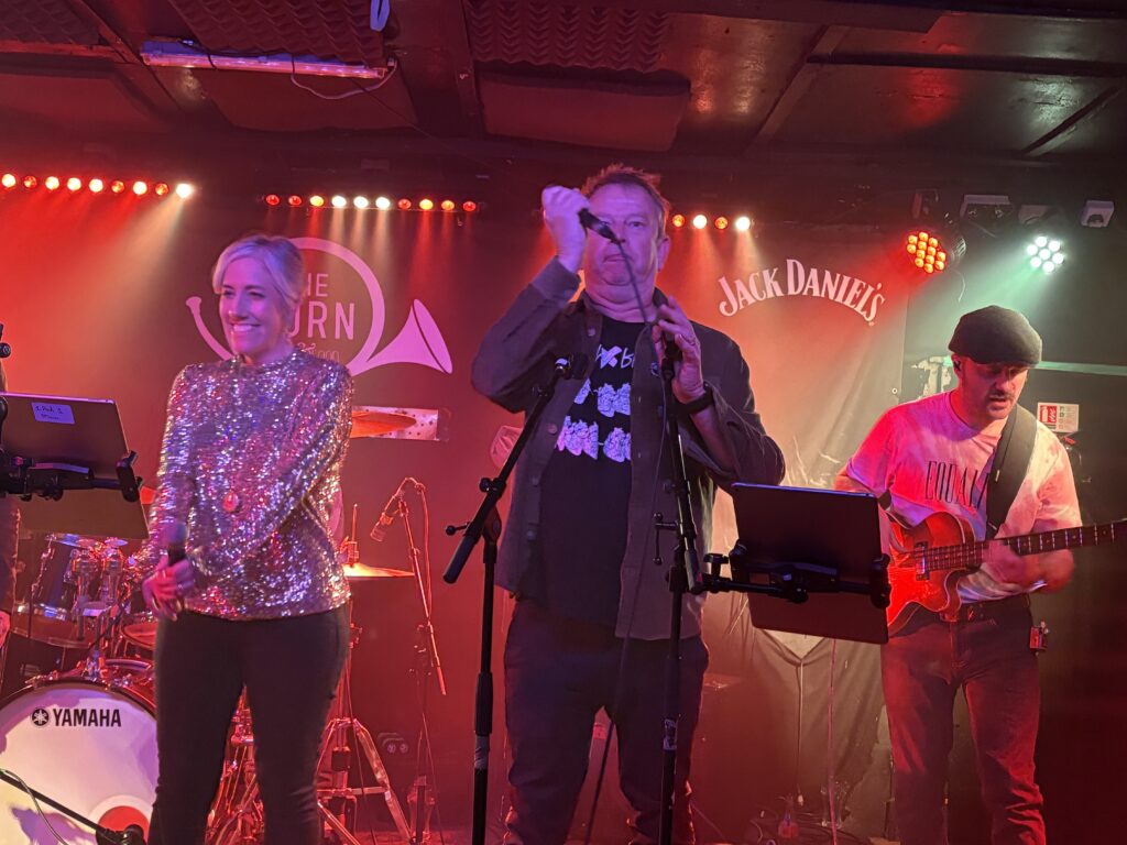 St Albans MP Daisy Cooper performs at The Horn's 50th birthday party.