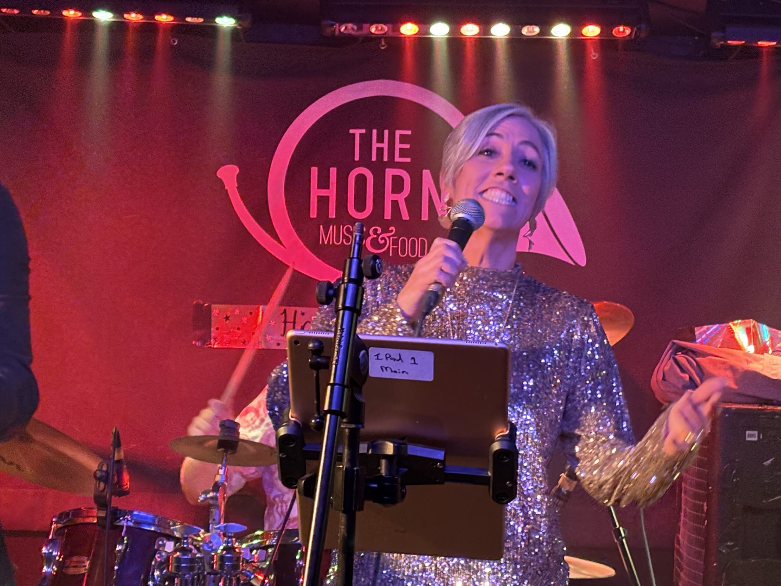 St Albans MP Daisy Cooper performs at The Horn's 50th birthday party.