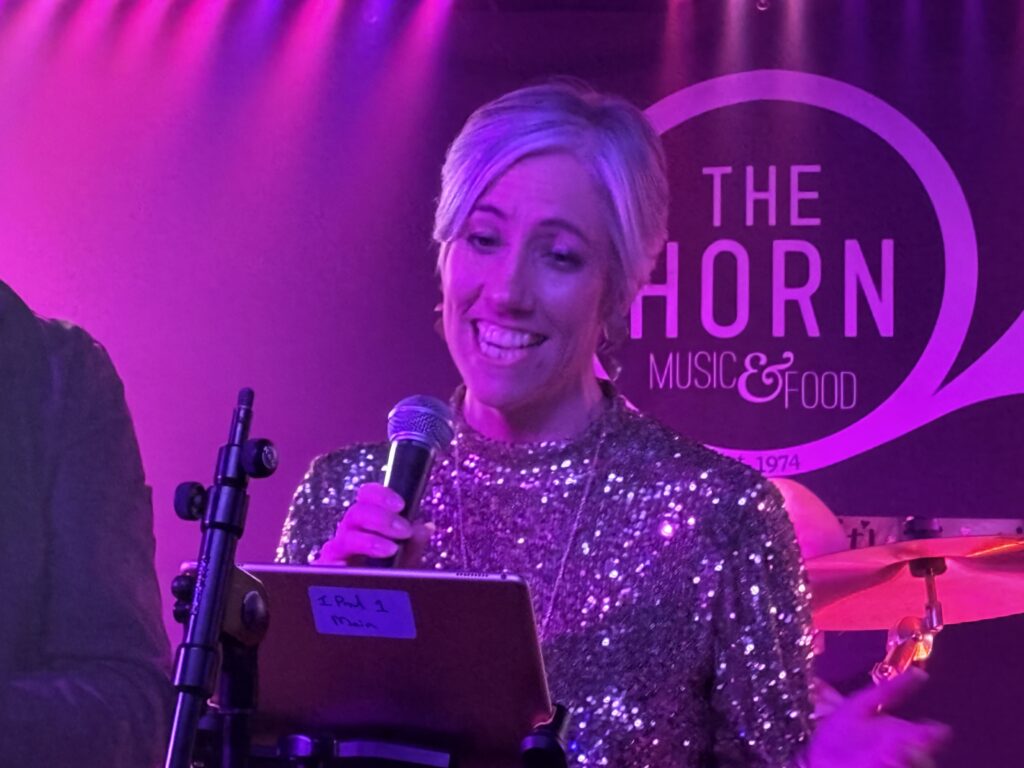 St Albans MP Daisy Cooper performs at The Horn's 50th birthday party.