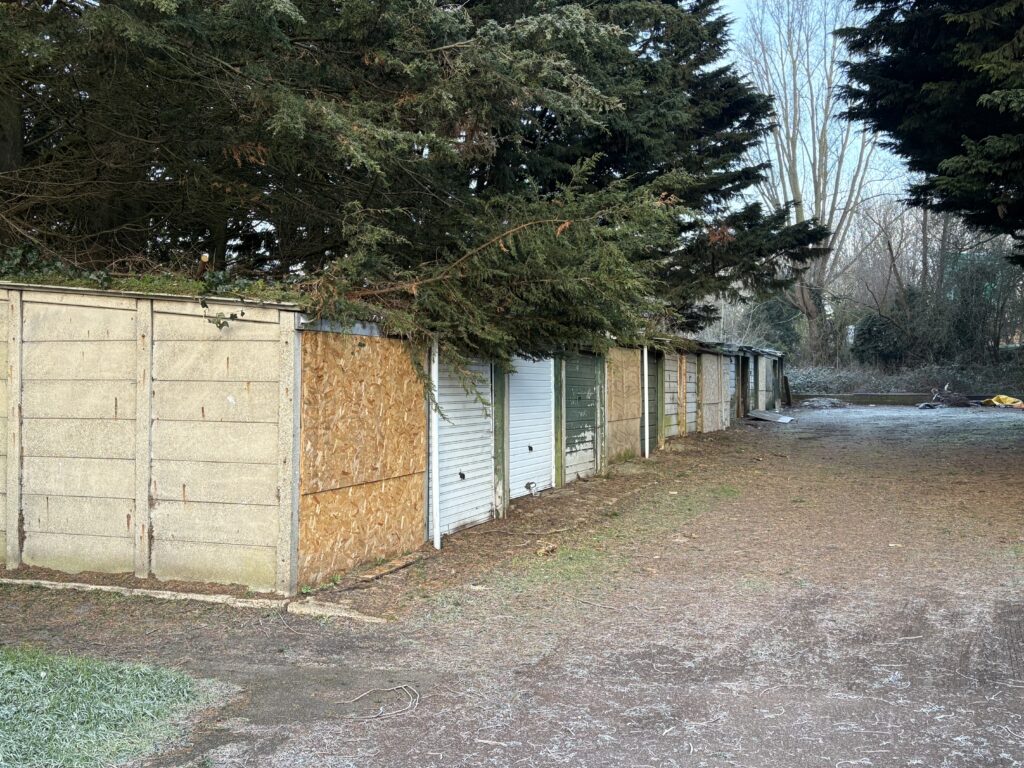 Derelict garages at Five Acres, London Colney, which are now used by rough sleepers.