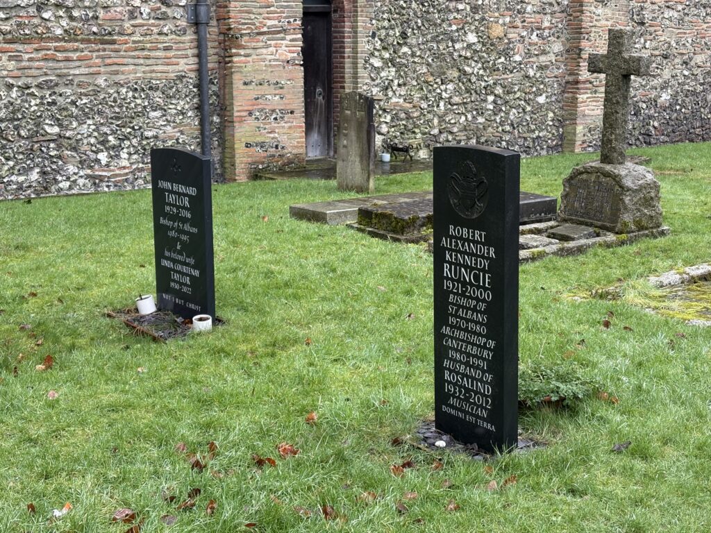 The gravestones of former Bishops of St Albans John Taylor and Robert Runcie.