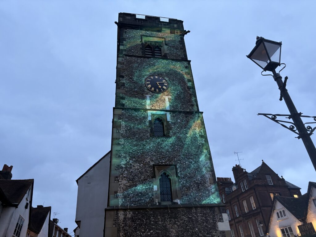 The Valentine's projection on the side of St Albans Clock Tower.