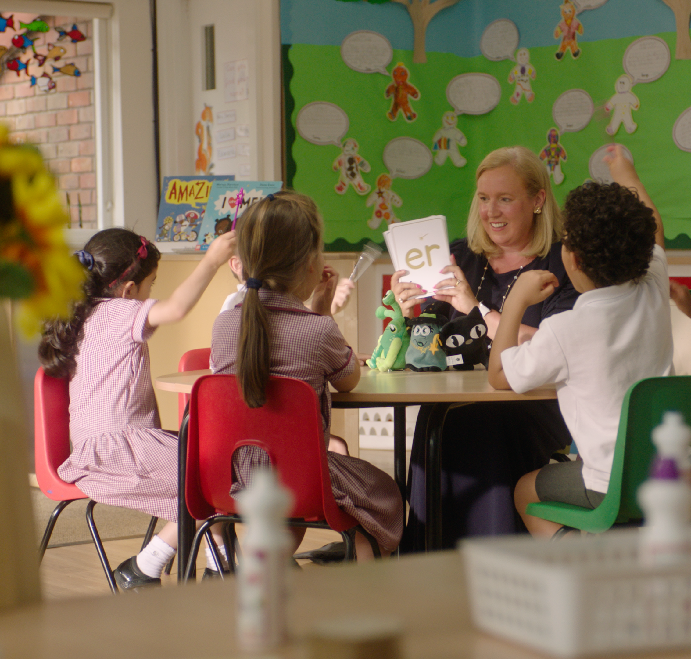 Sam McIntosh with Early Years children