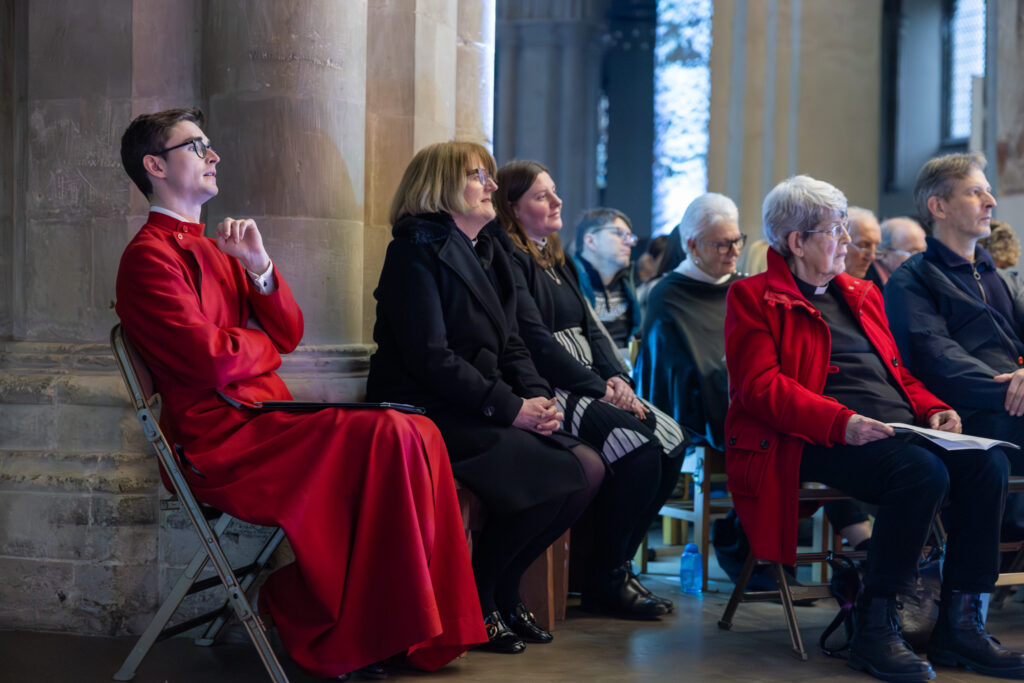 Cathedral choristers singing beneath the Moon. Photo: Toby Shepheard.