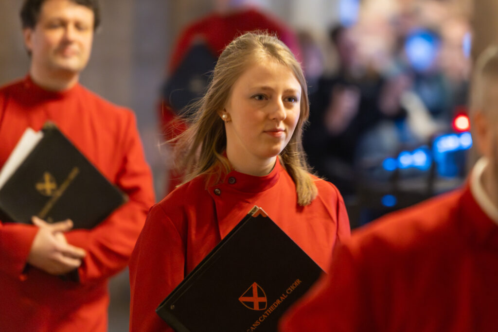 Cathedral choristers singing beneath the Moon. Photo: Toby Shepheard.