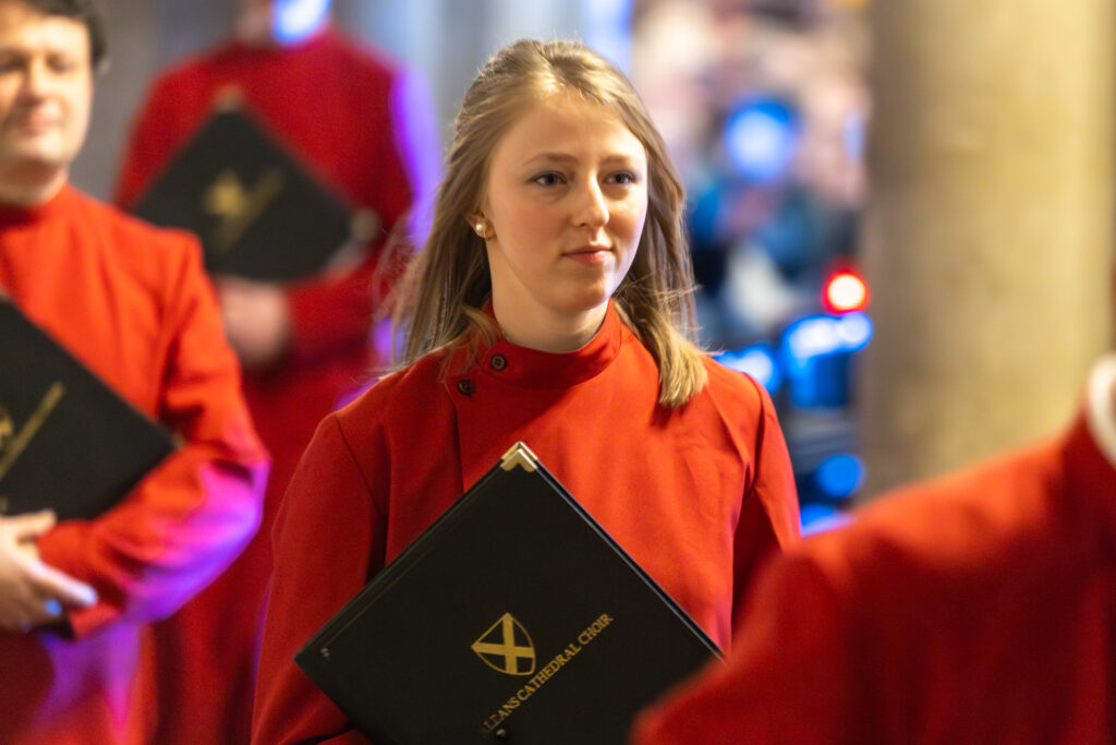 Cathedral choristers singing beneath the Moon. Photo: Toby Shepheard.