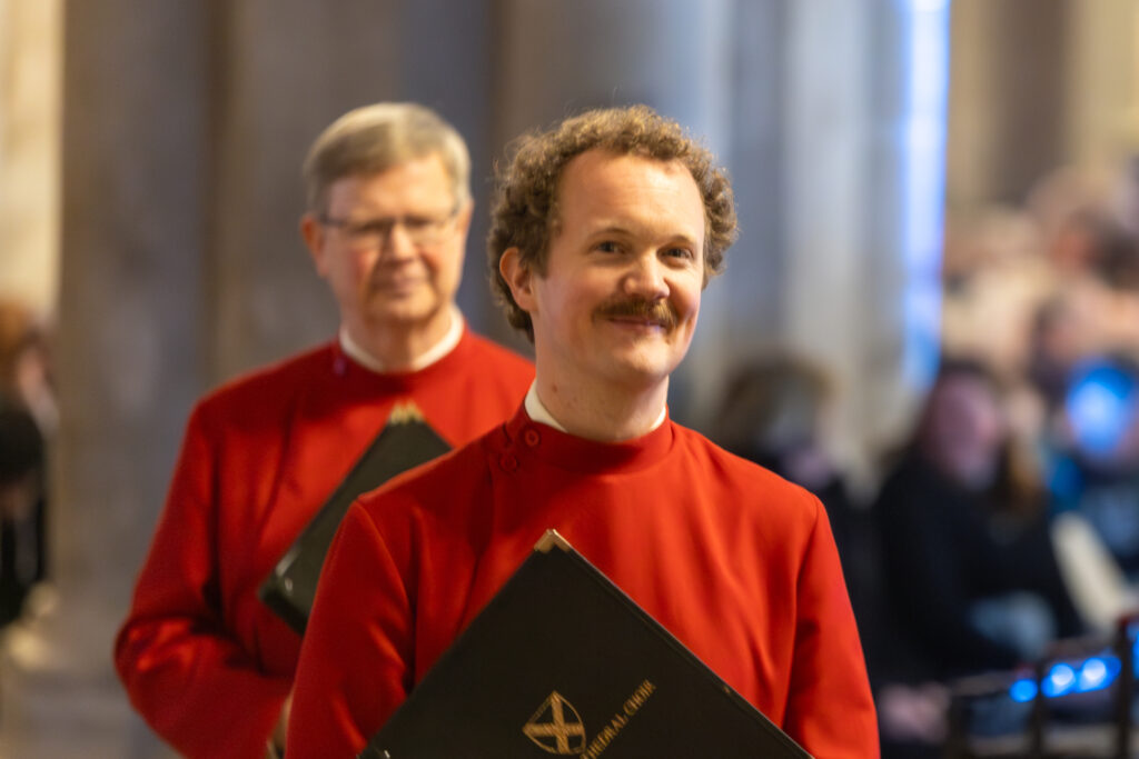 Cathedral choristers singing beneath the Moon. Photo: Toby Shepheard.