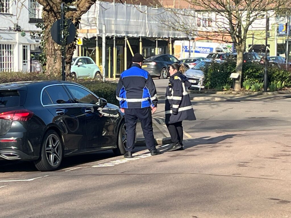 Parking attendants on patrol in Harpenden