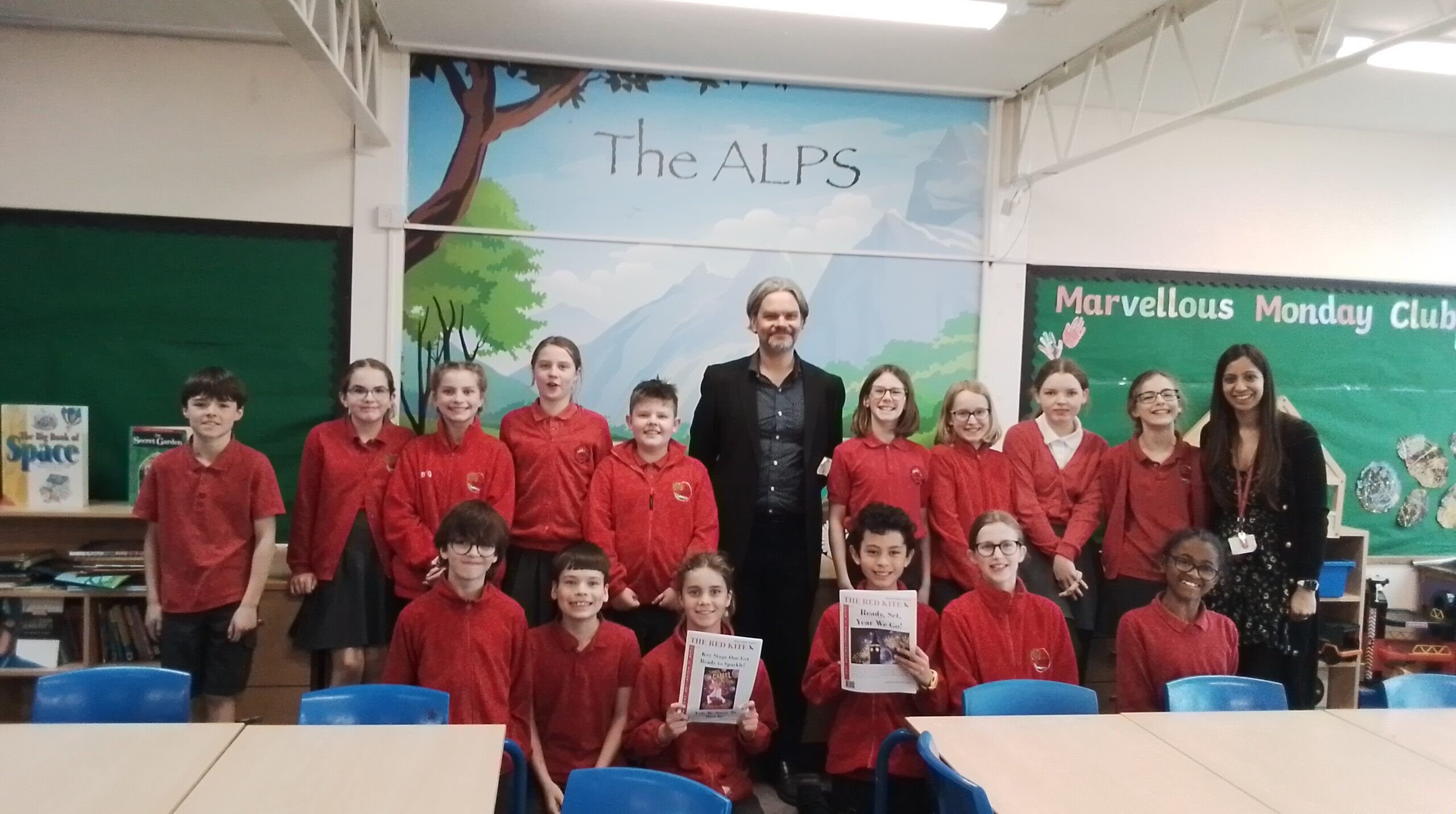 Matt Adams with members of the Red Kite editorial team at Redbourn Primary School.
