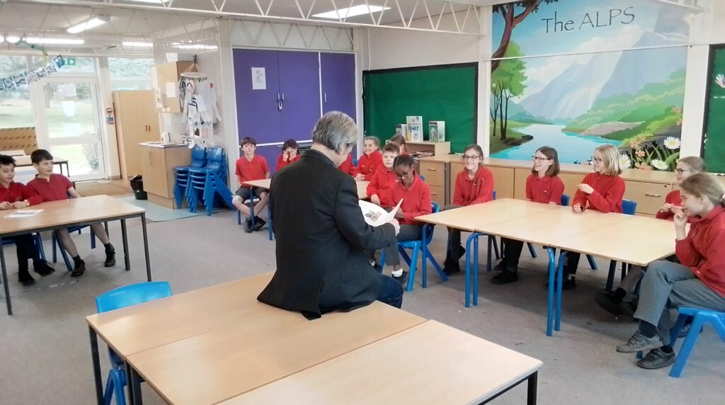 Matt Adams with members of the Red Kite editorial team at Redbourn Primary School.