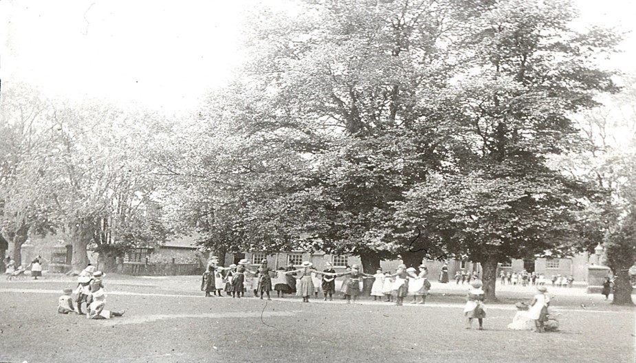 Children dancing on the Common outside the British School (now Park Hall);