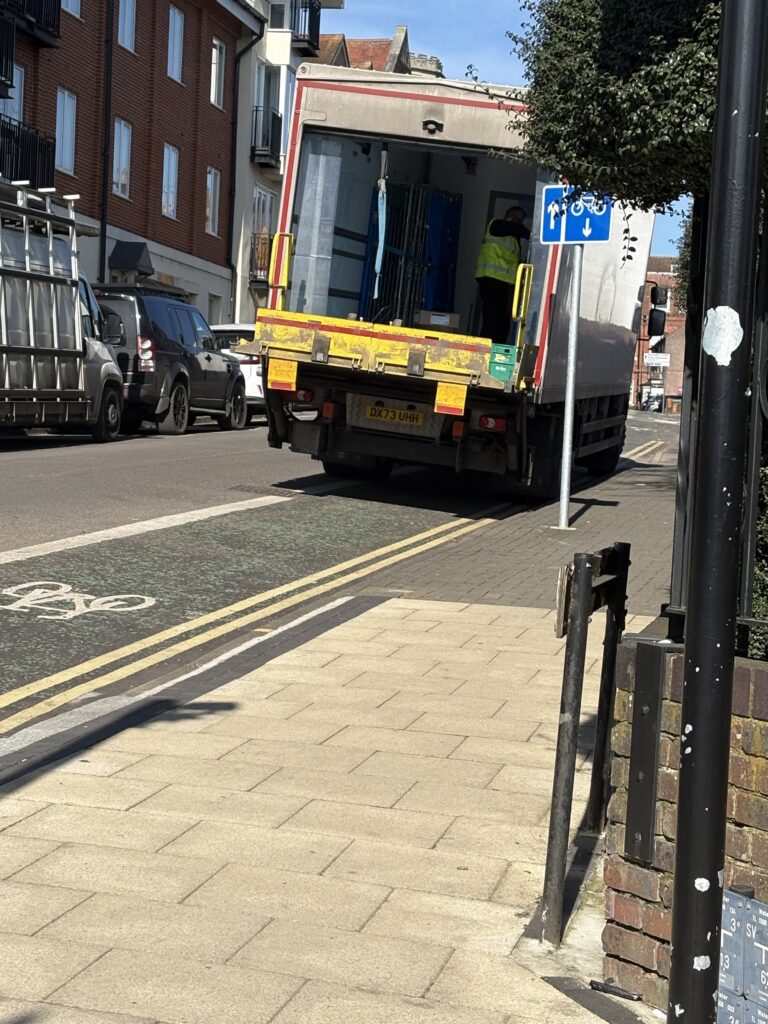 Delivery drivers frequently block the cycle lane.