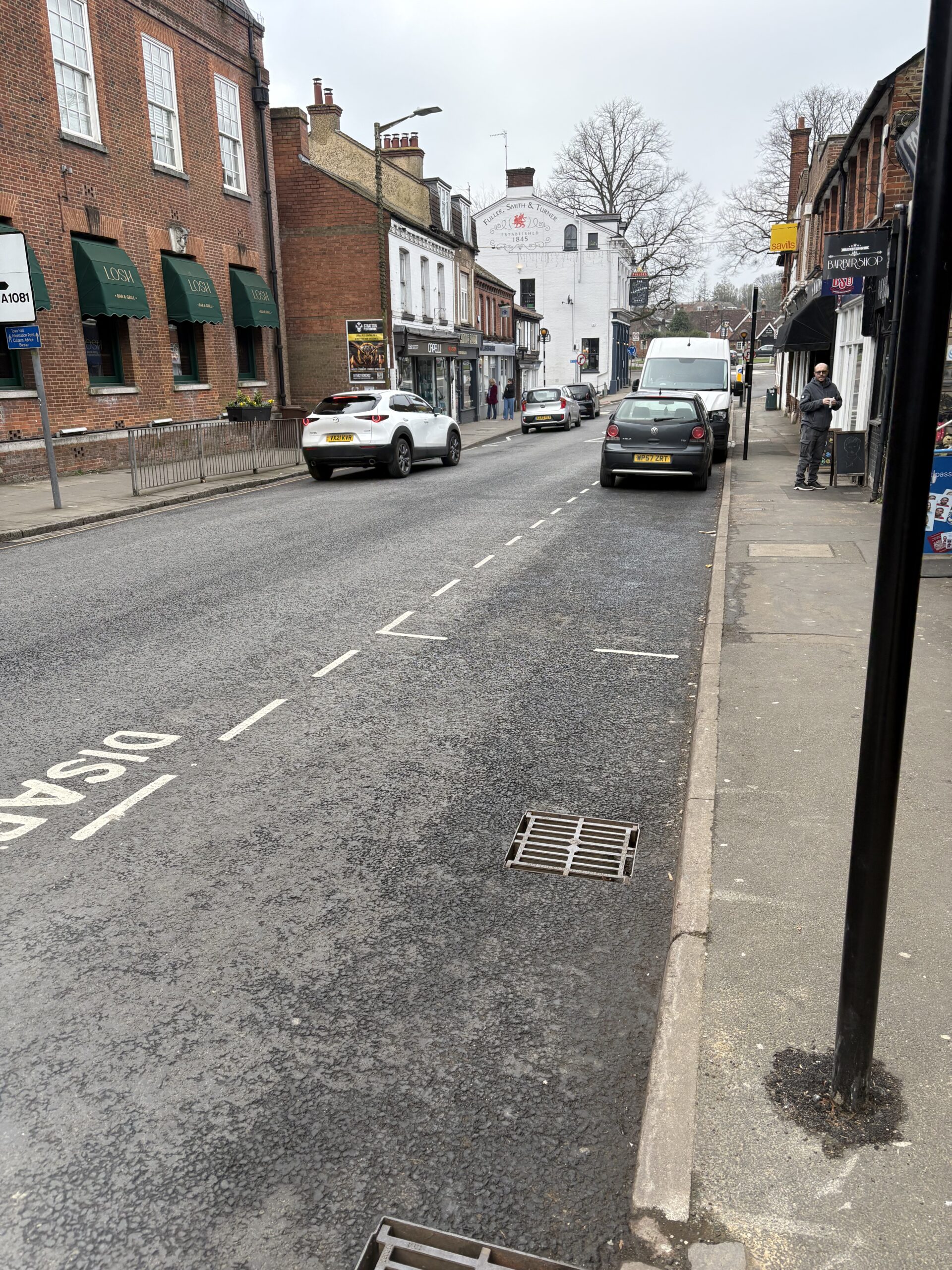 Empty parking bays in Station Road, Harpenden