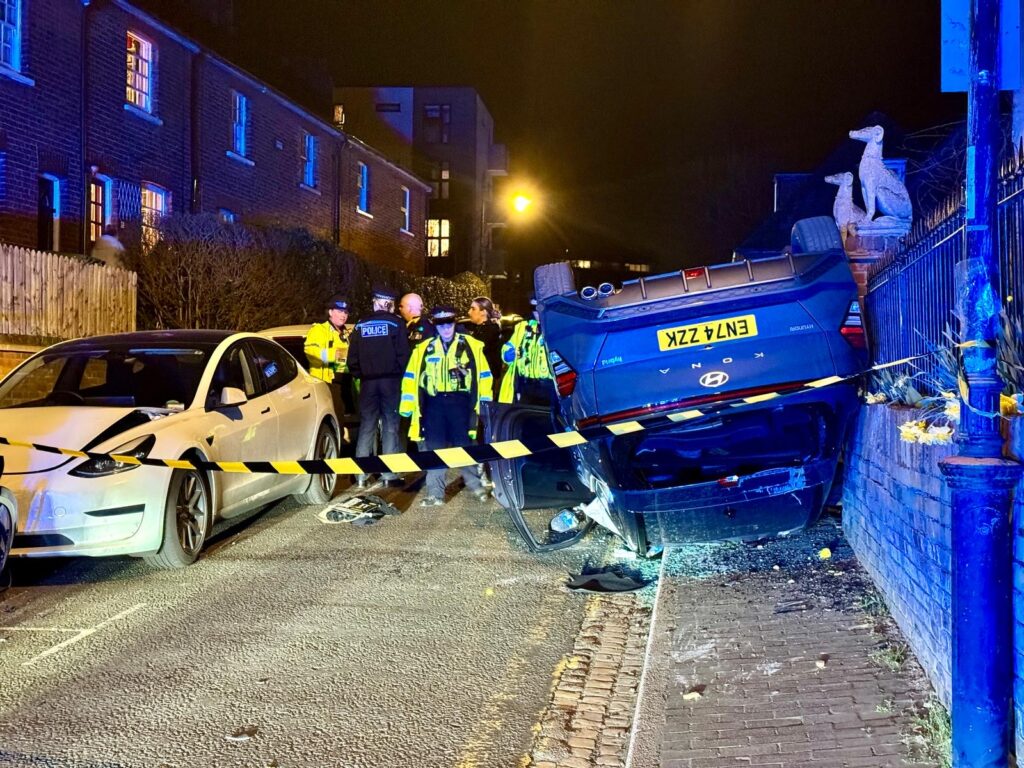 Flipped car in Old London Road. Photo: Toby Shepheard.