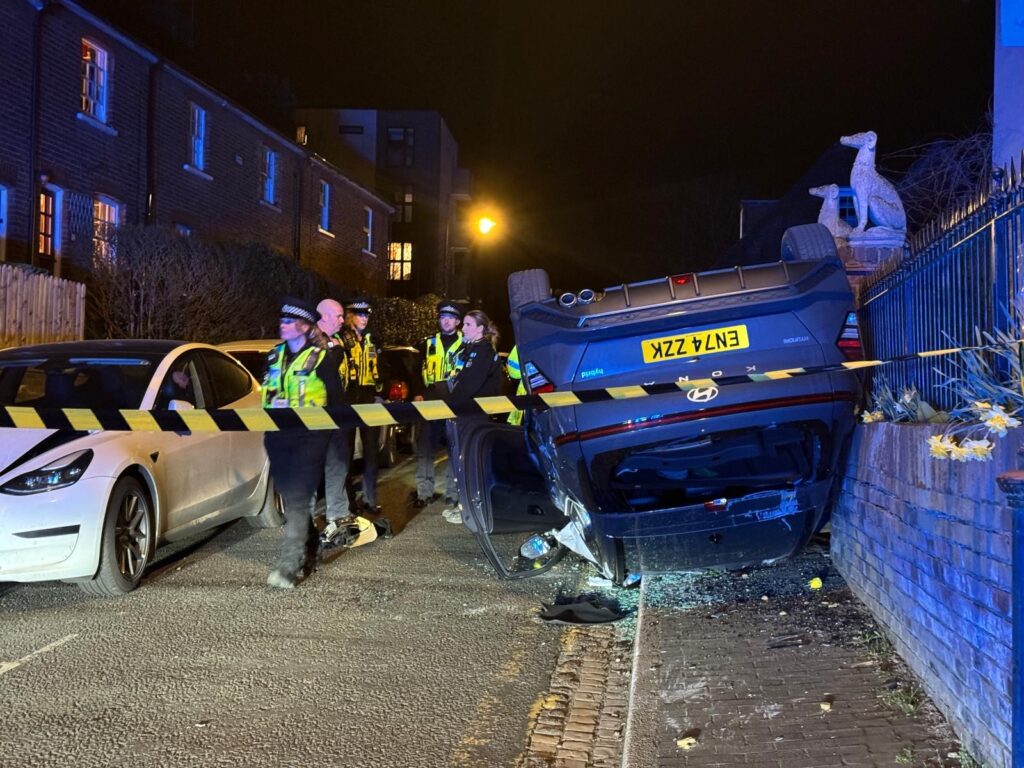 Flipped car in Old London Road. Photo: Toby Shepheard.