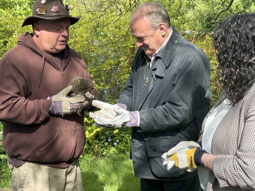 Victoria Collins and Ed Davey at Hornbeam Hedgehog Sanctuary in Harpenden.