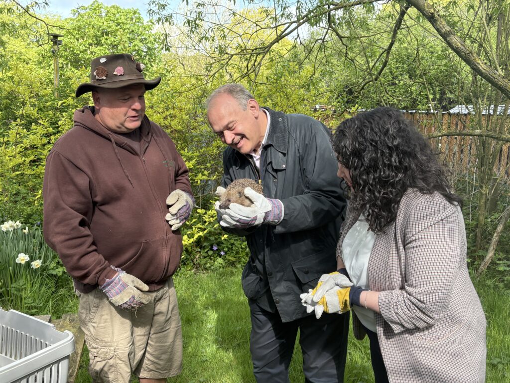 Victoria Collins and Ed Davey at Hornbeam Hedgehog Sanctuary in Harpenden.