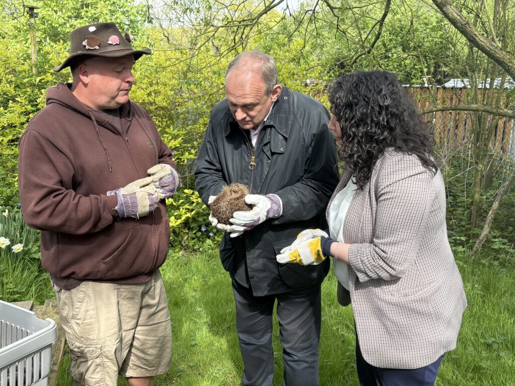 Victoria Collins and Ed Davey at Hornbeam Hedgehog Sanctuary in Harpenden.