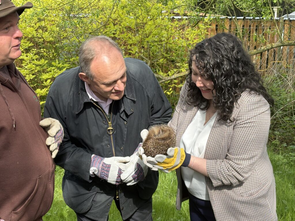 Victoria Collins and Ed Davey at Hornbeam Hedgehog Sanctuary in Harpenden.