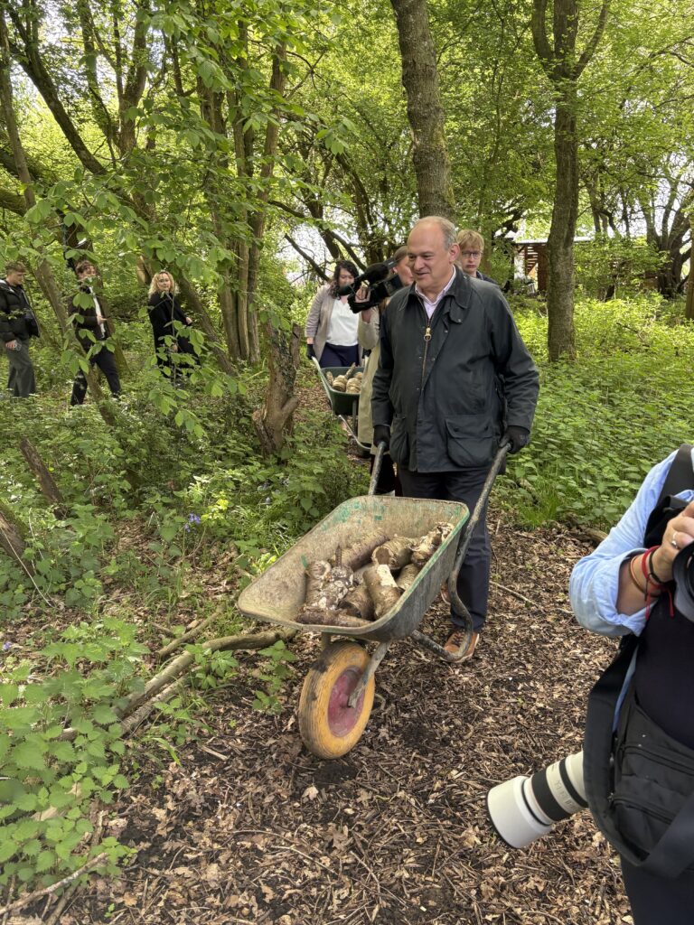 Victoria Collins and Ed Davey at Hornbeam Hedgehog Sanctuary in Harpenden.