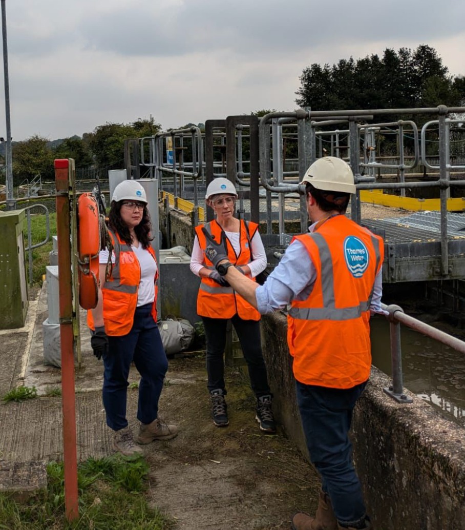 Daisy and Victoria challenging Thames Water on leaky sewage pipes during a visit to Markyate sewage works.
