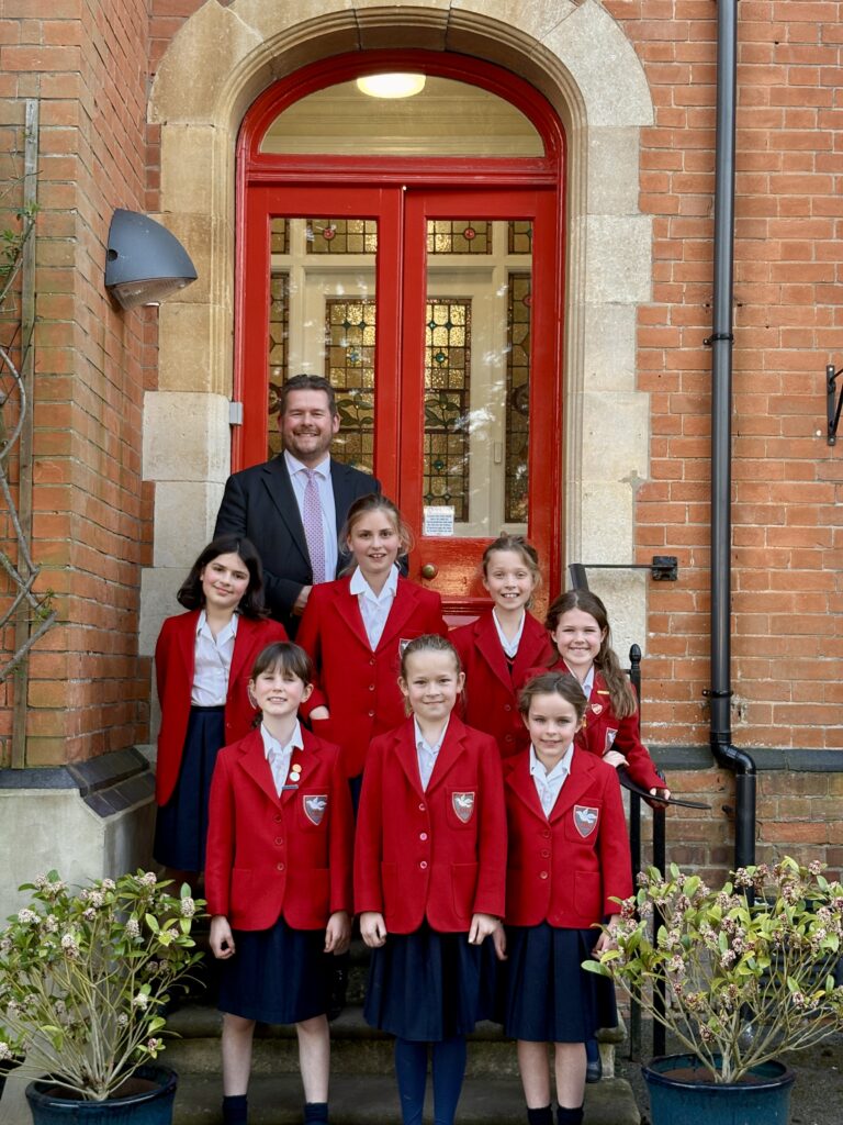 Head Daniel Sayers with pupils from St Hilda's in Harpenden.