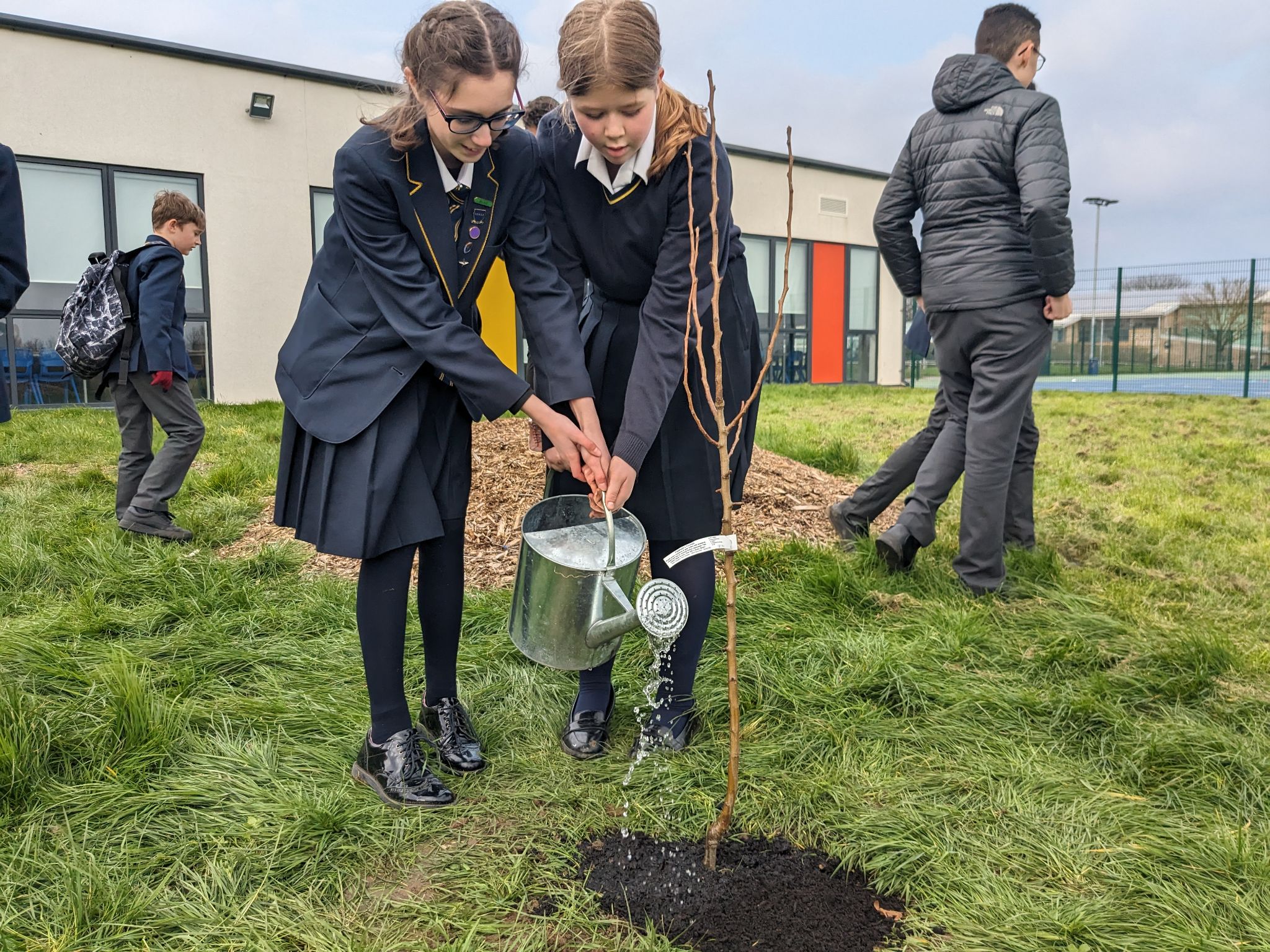 Planting the Veolia Orchard.