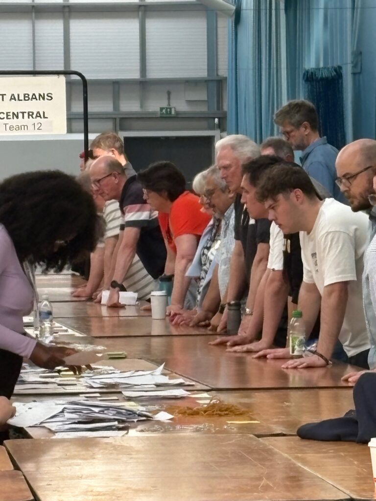 Checking the ballots ahead of the St Albans Central recount.