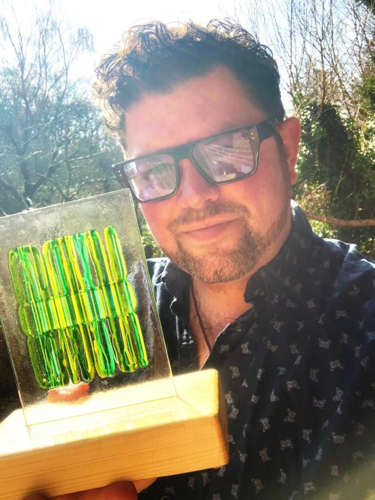 Lee Wood with an Ember Eco Award