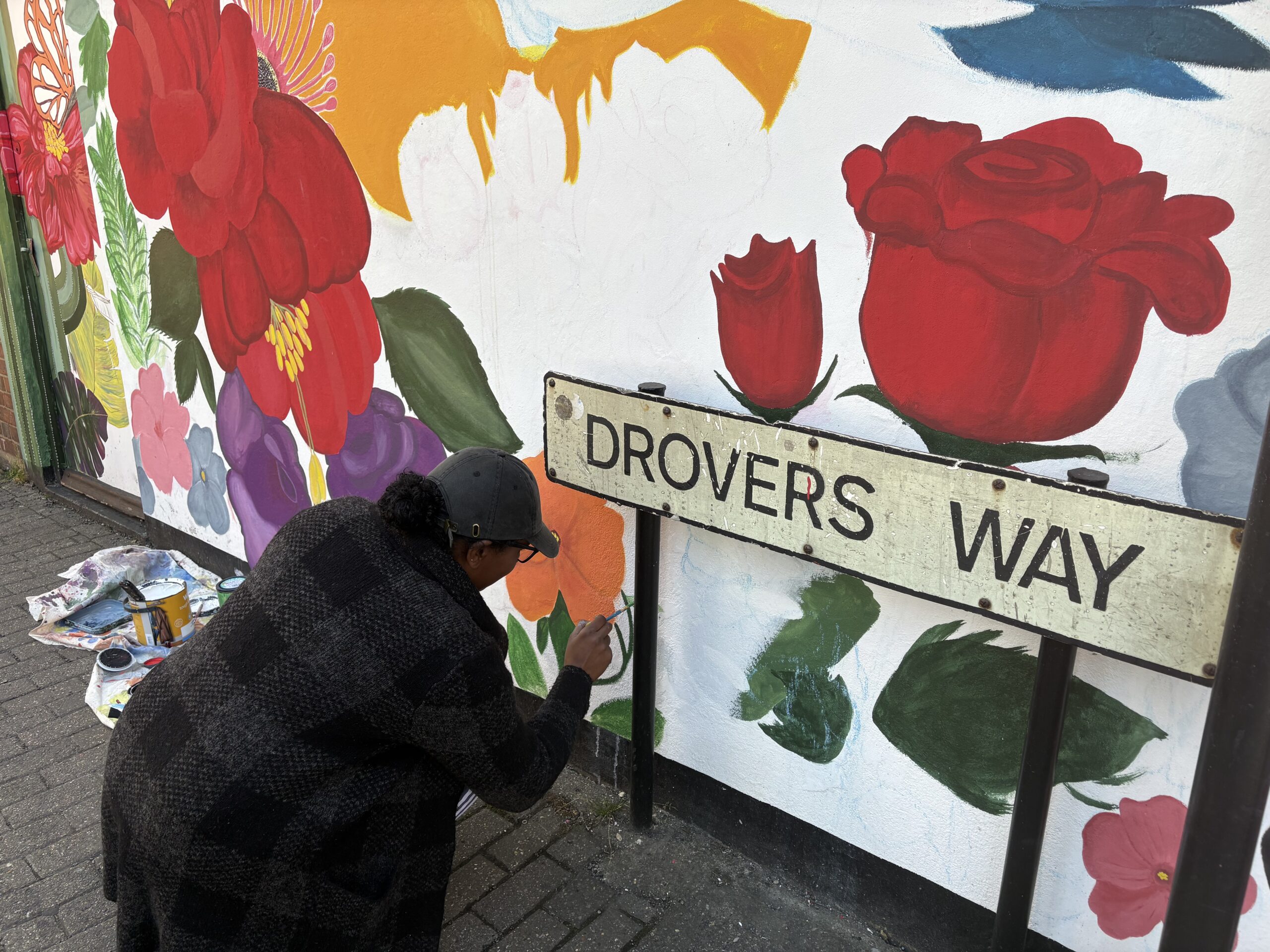 Aisha working on the new mural in Drovers Way