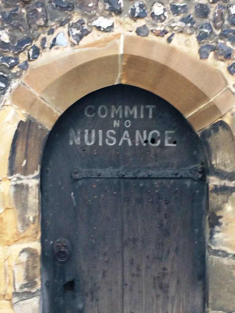 The 'Commit no nuisance' door to the Clock Tower