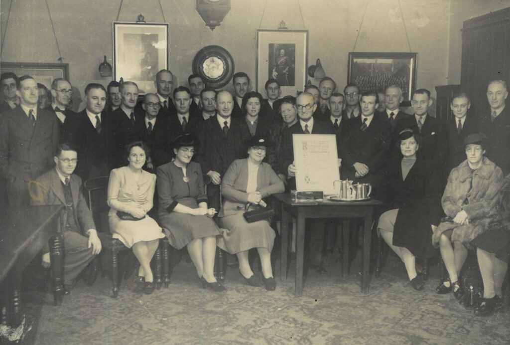 Harry Carrington’s 50-year anniversary party at the Town Hall in 1946, for which he received an illuminated address and a silver tea set
