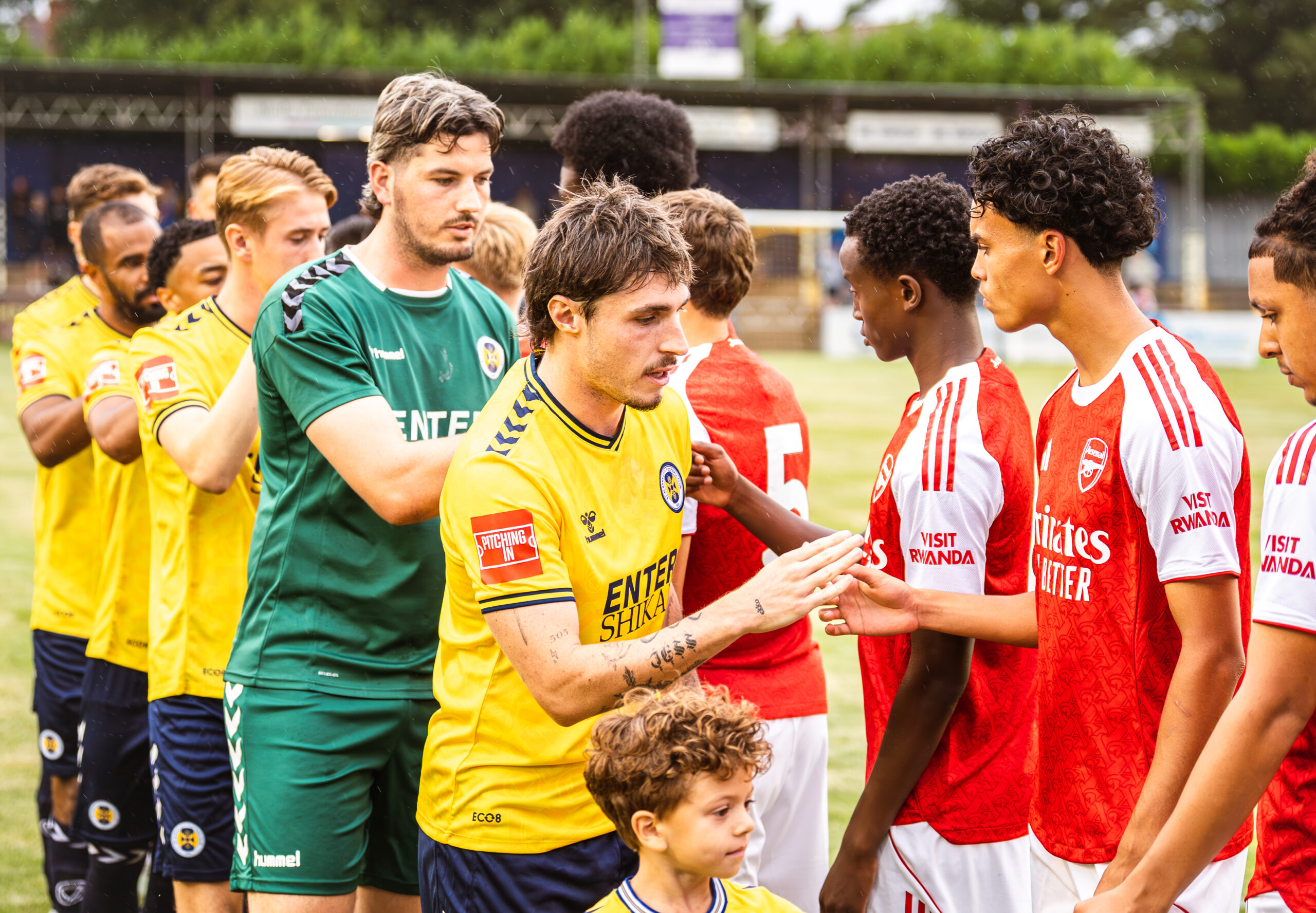 Jack James and keeper Magnus Norman at the Arsenal match. Photo: Dean Pegg.