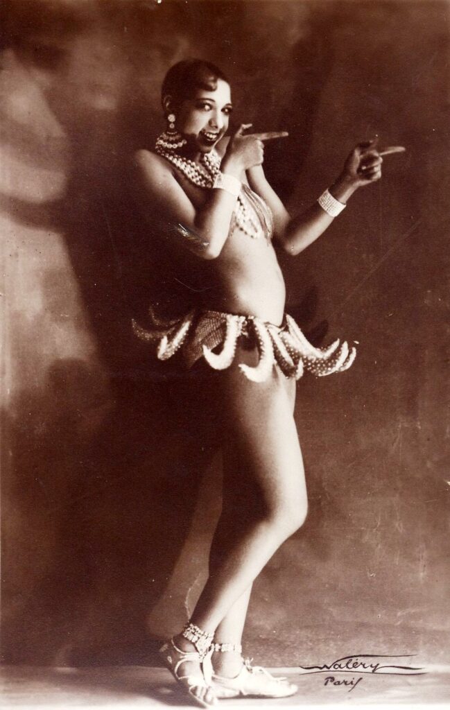 Josephine Baker in banana costume at the Folies Bergère, 1927. By Lucien Walery.