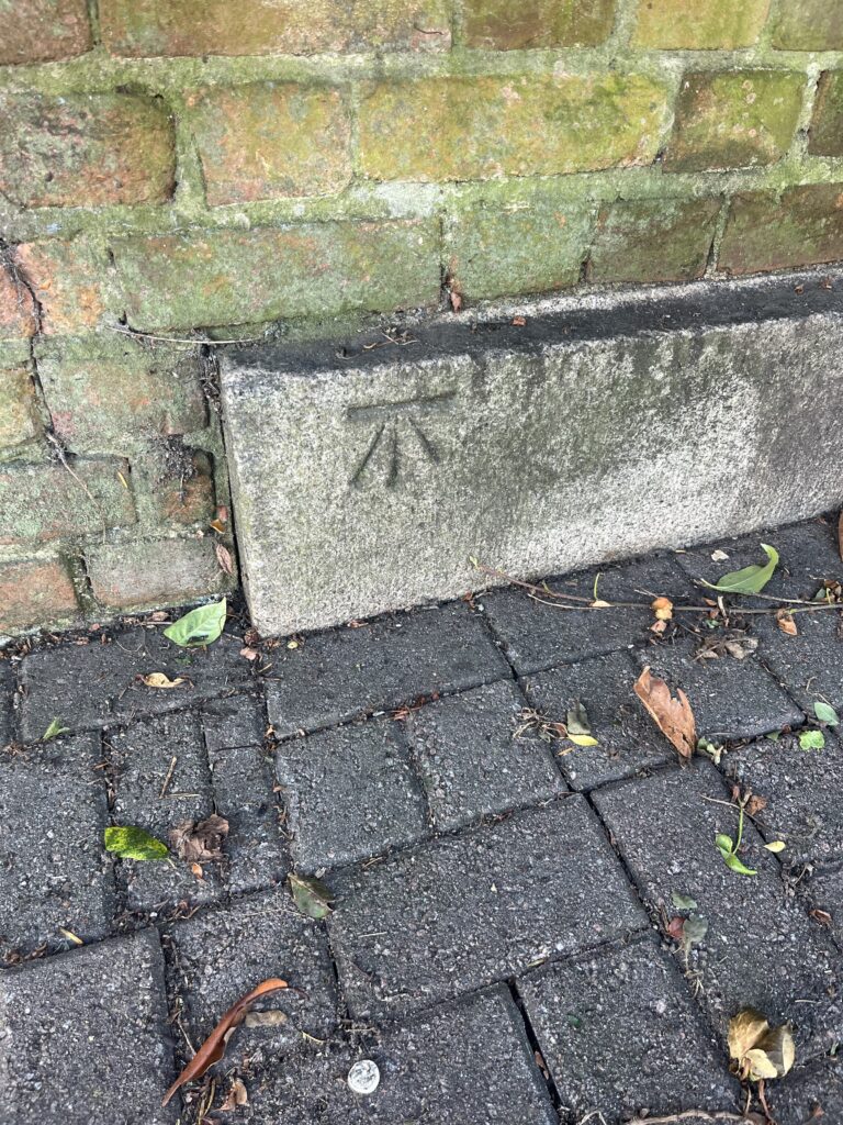 A carving on the Marlborough almshouses.