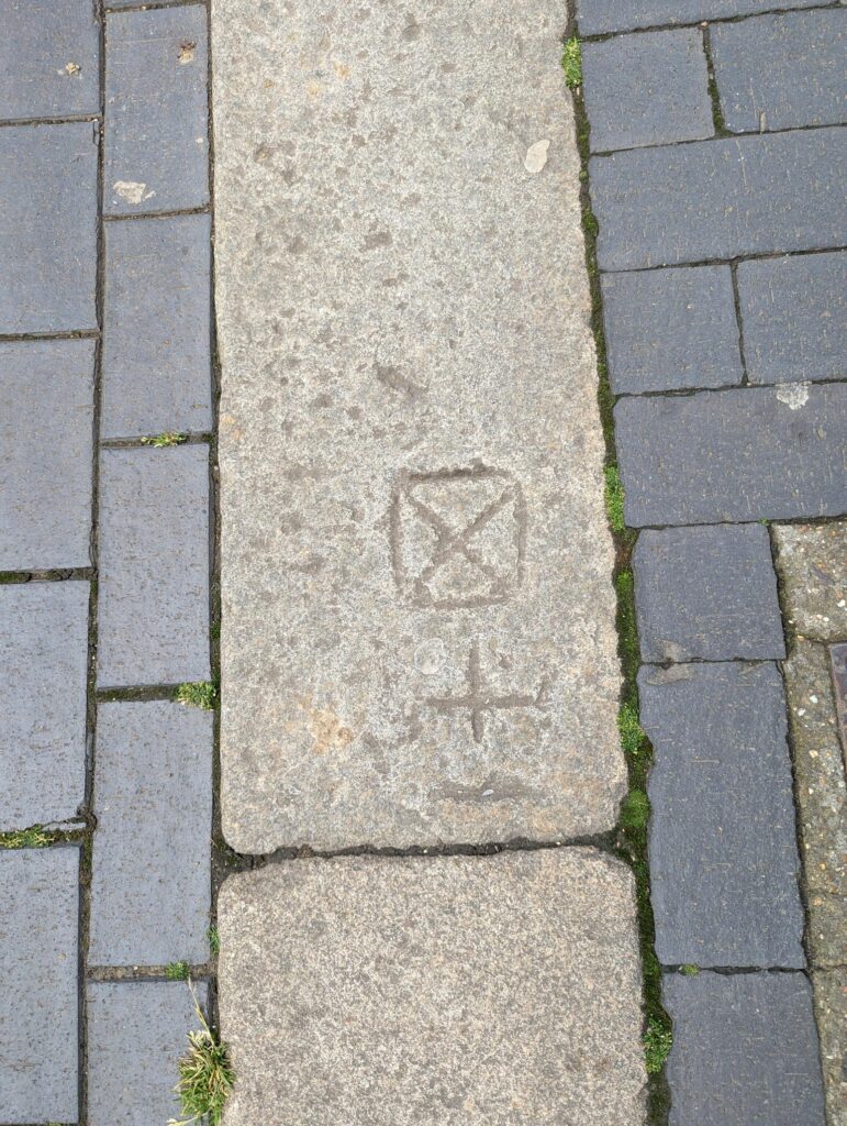 Markings on the street in Market Place.