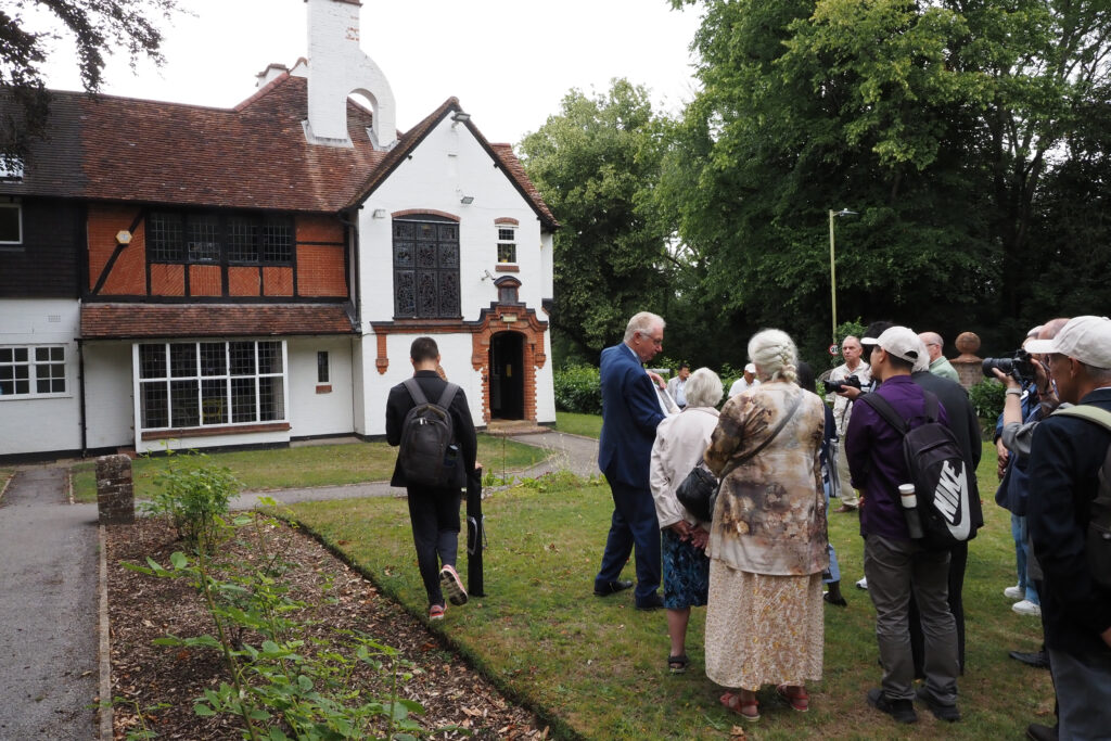 Red Gables, West Common where George Hogg was born in 1915 - reception party and Chinese press waiting to go in