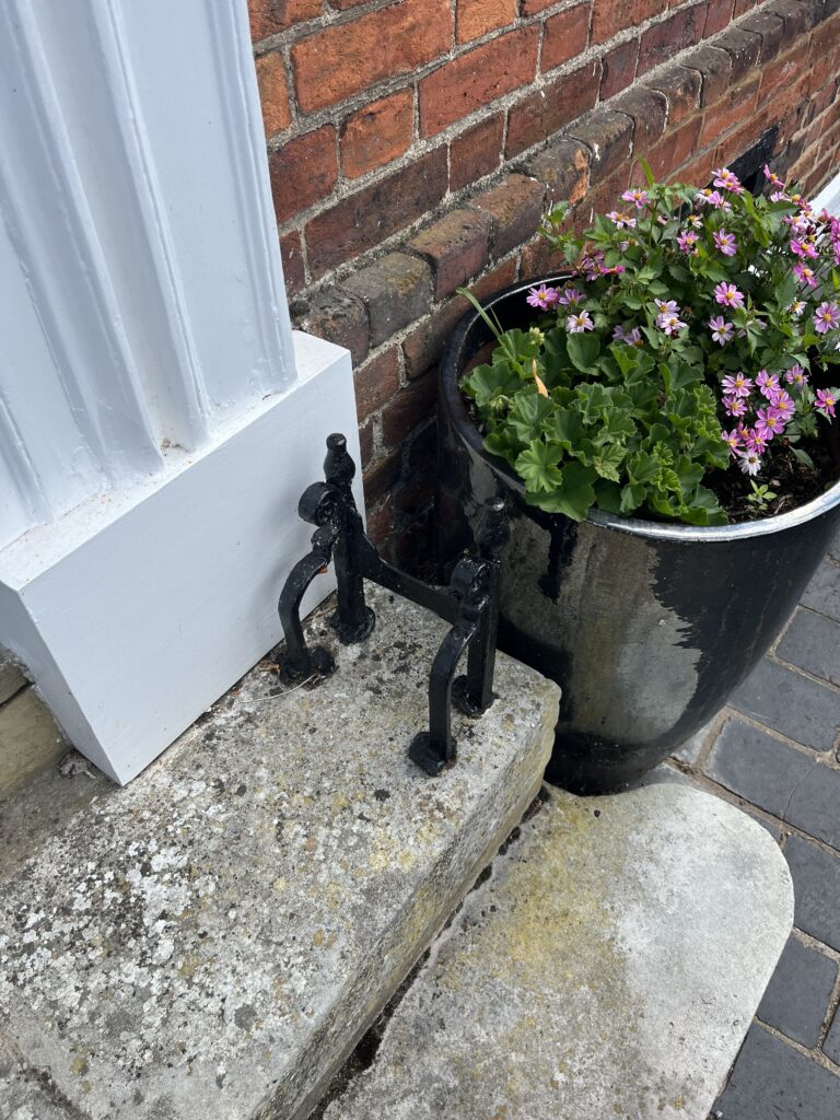 A bootscraper in Fishpool Street.
