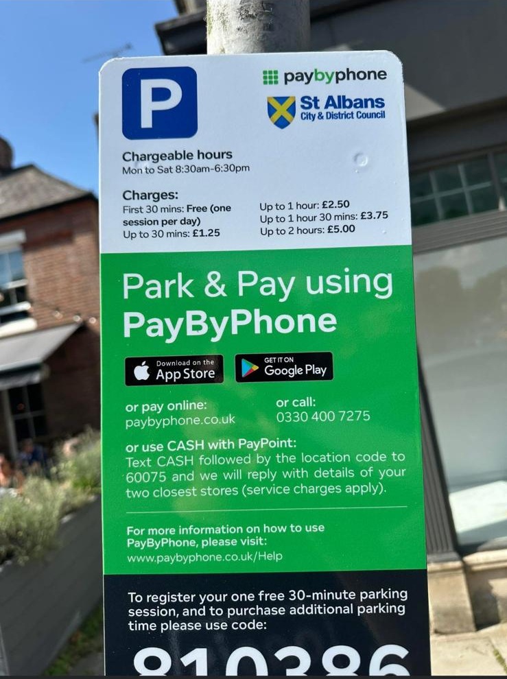 The inaccurate parking sign.