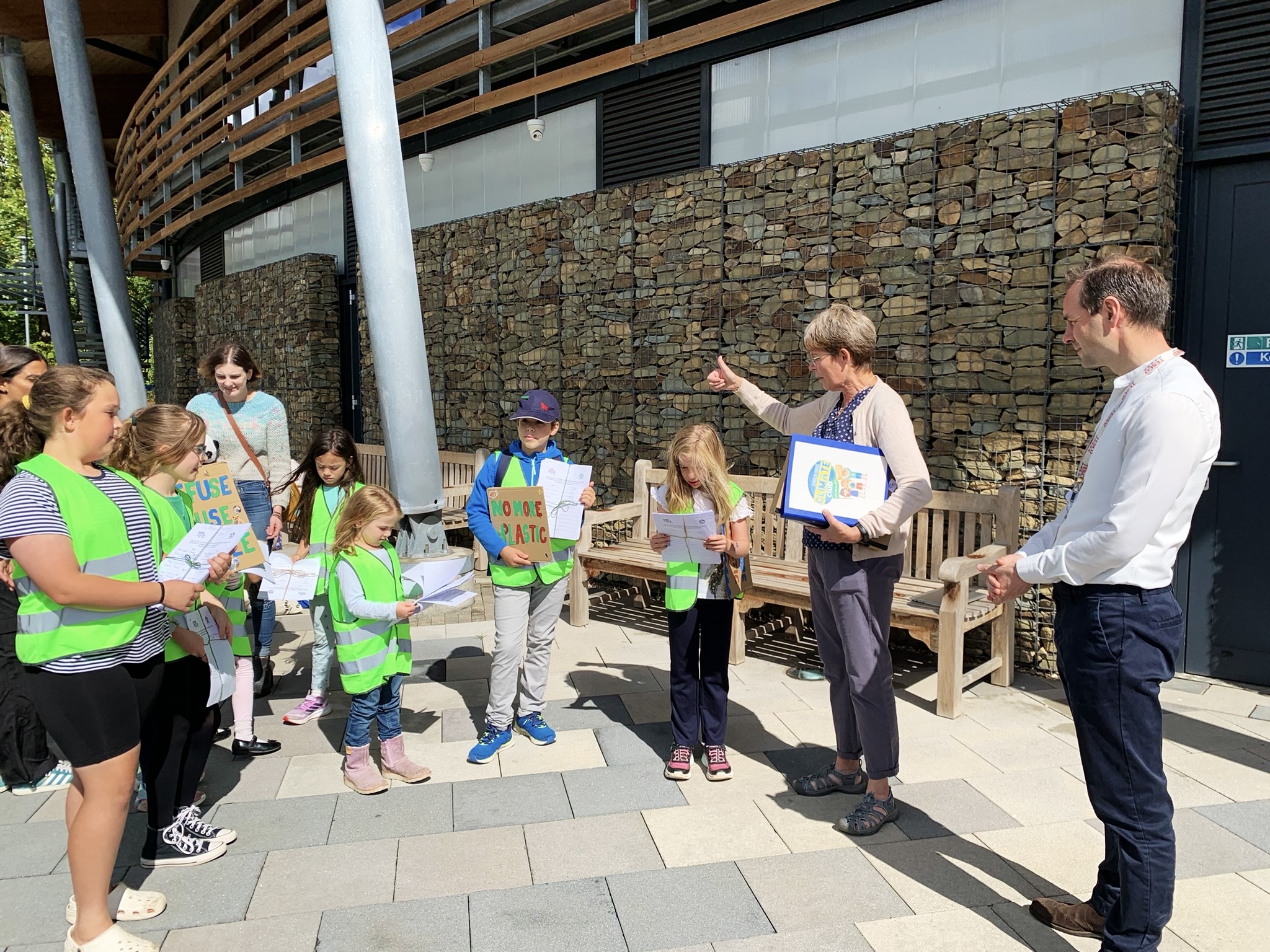 The Climate Club took their campaign against plastic toys and wrapping on children's comics to Tesco's HQ. Photo: Lee Wood