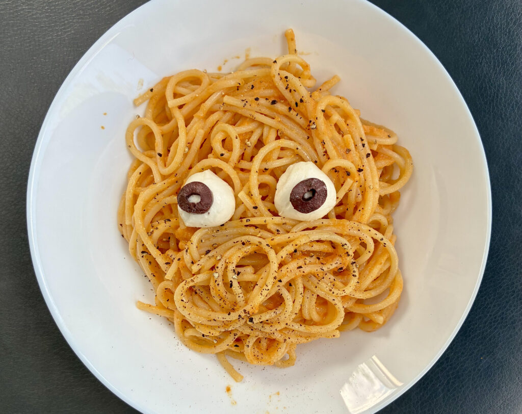Halloween pumpkin spaghetti with eyeballs