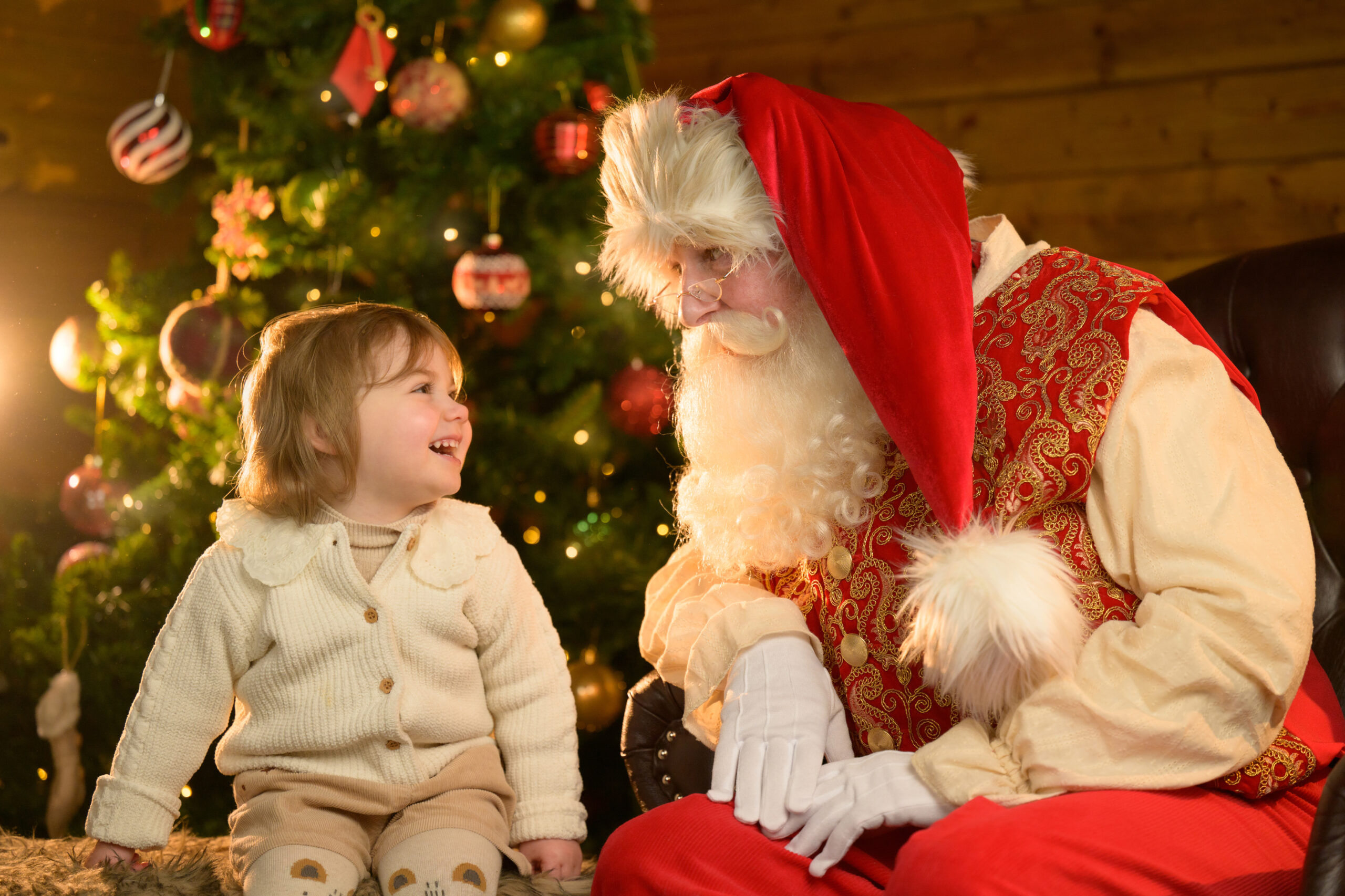 Three-year-old Emily meets Santa.