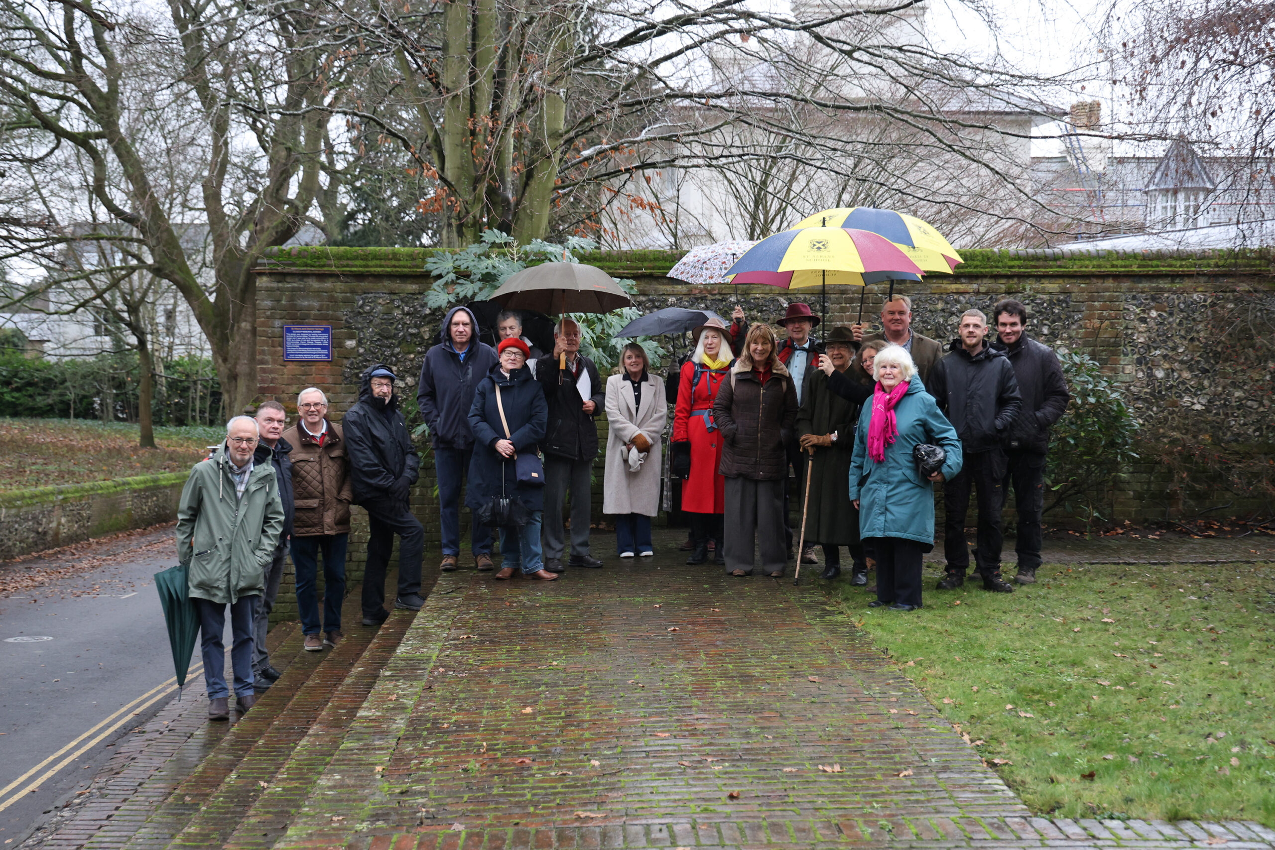 The installation of the new plaque in the Glossop Memorial Garden.