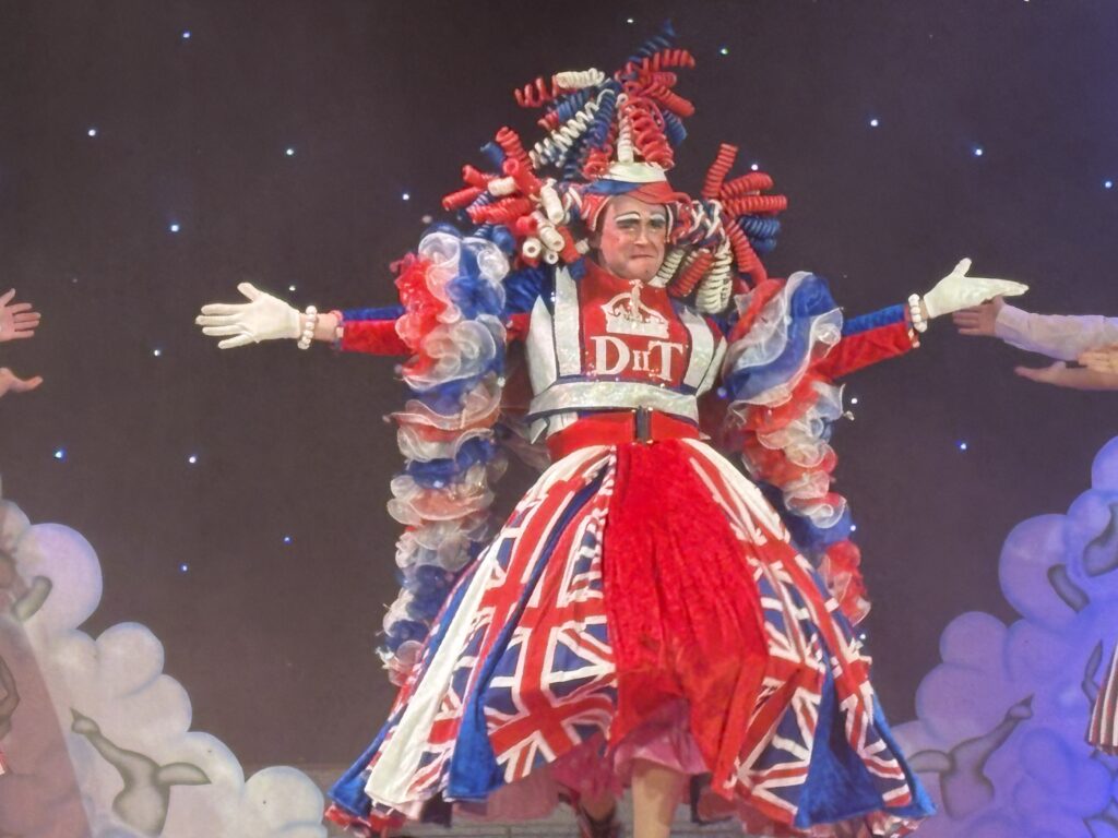 Josh Handley as Dame Tilly Trott
