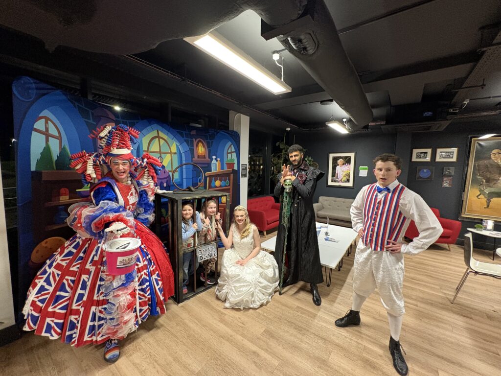 The panto stars were collecting for local charity the AT Society after the show.